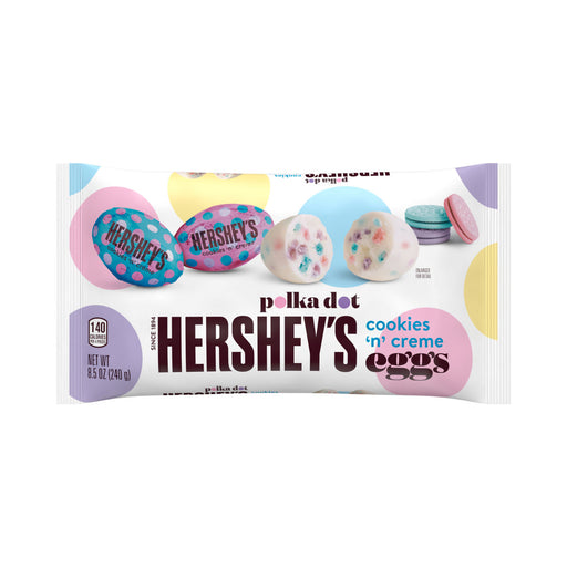 Indulge in Hershey Cookies and Creme Polka Dot Eggs - a playful twist on classic flavors. With creamy white chocolate and colorful cookie bits, these eggs are a unique treat perfect for the holiday. 8.5oz bag. Hop to it!