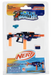 Nerf World's Smallest Single Action Fire in a blister pack with a toy blaster, foam darts, and accessories on a white background.