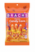 A bag of Brach's Classic Candy Corn, featuring a bright orange package with a purple and white Brach's logo and illustrations of candy corn.