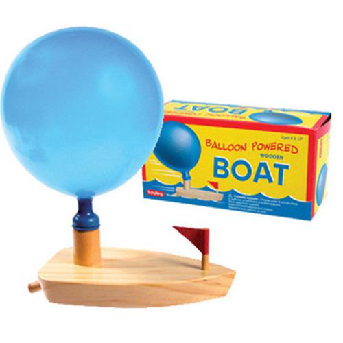 Balloon-powered wooden boat with a box labeled 'Balloon Powered Boat' on a white background