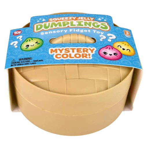 A toy fidget toy shaped like a dumpling in a beige plastic container with a blue cardboard hanger. The packaging reads 'Squeezy Jelly Dumplings Sensory Fidget Toy' and 'Mystery Color!' with cartoon jelly dumpling illustrations.