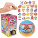 A toy surprise egg set called 'Fun Drop Squish Characters' shown with its retail box, a large blue and yellow surprise egg, a hand holding a small character figure, and a grid of many colorful character figures on a white background.