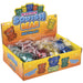 A display box of metallic sticky squish bears. The yellow and orange cardboard packaging features colorful cartoon bear illustrations and the text 'STICKY SQUISH BEAR METALLIC'.