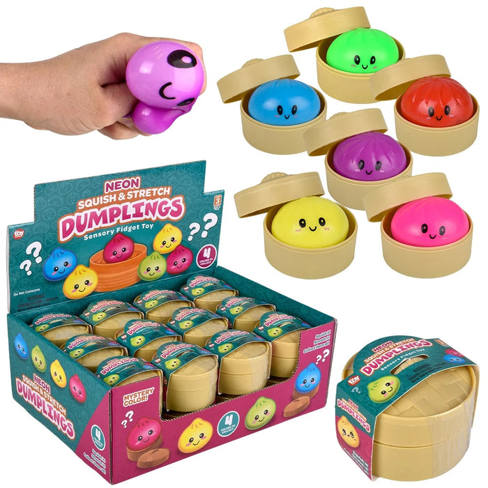 A display of 'Neon Squishy Stretch Dumplings' by Craft Kid Novelty, showing a large retail display box filled with colorful surprise dumplings, a single open bamboo-style container with a yellow dumpling, a single pink container with a pink dumpling, and a hand holding a purple dumpling.