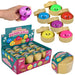 A display of 'Neon Squishy Stretch Dumplings' by Craft Kid Novelty, showing a large retail display box filled with colorful surprise dumplings, a single open bamboo-style container with a yellow dumpling, a single pink container with a pink dumpling, and a hand holding a purple dumpling.