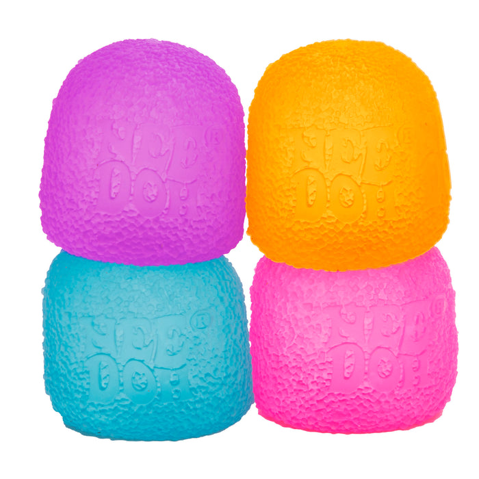 Four colorful rubber dog toys stacked on a white background