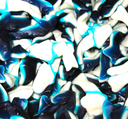 Unleash a snack attack with our Bulk Gummy Blue Sharks! These tasty treats features two layers of flavorful gummy goodness and jaw-dropping deliciousness. Perfect for satisfying cravings or adding some bite to your party snacks. Warning: may cause a feeding frenzy. (Shark-wrangler certification not included.)