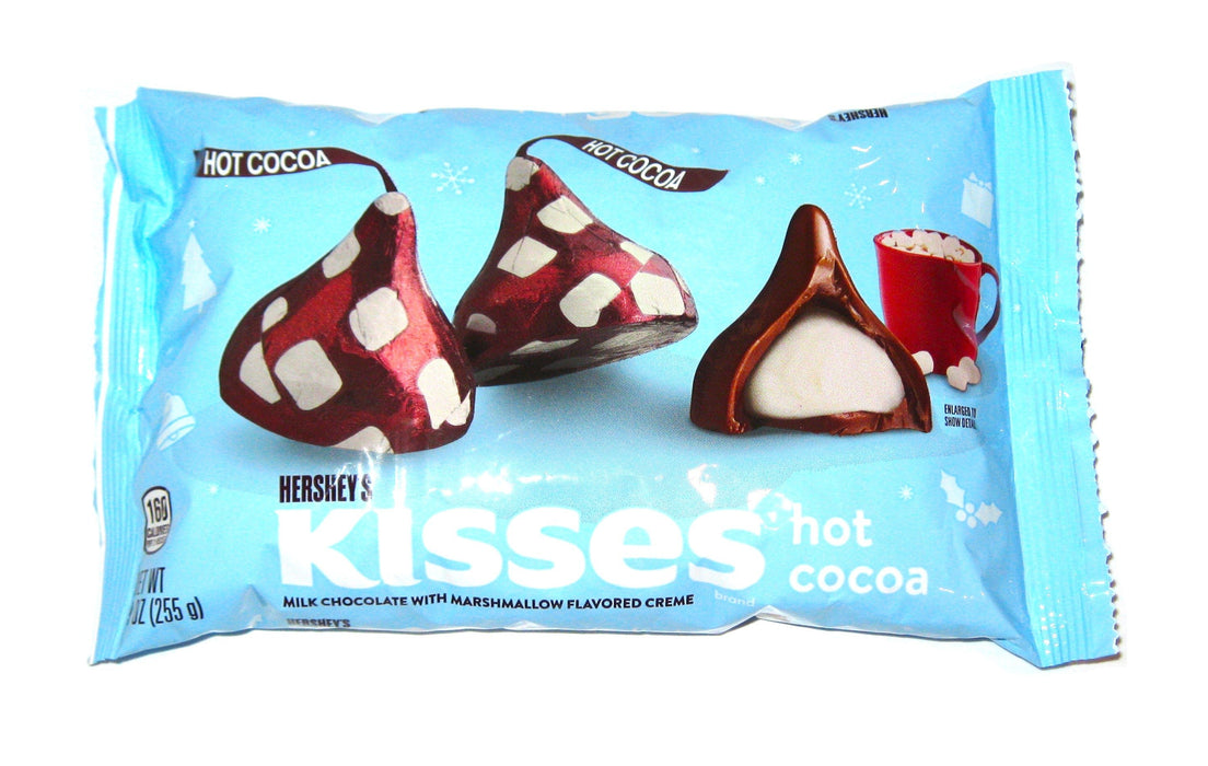 Indulge in the festive flavor of Christmas Hershey Kisses Hot Cocoa! These milk chocolate kisses are wrapped in brown foil with marshmallows printed on top, creating a sweet and creamy delight that no one can resist. Perfect for sharing with guests during the holiday season.