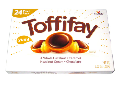 Indulge in the perfect balance of chewy caramel, whole hazelnuts, and decadent chocolate with our Christmas Toffifay Holiday 24ct Gift Box. Each piece is carefully crafted by spinning chewy caramel into a cup, adding a whole hazelnut, filling it with a rich chocolate and hazelnut mixture, and topping it with a delicious drop of chocolate. Treat yourself or your loved ones to a luxurious and joyful holiday season.