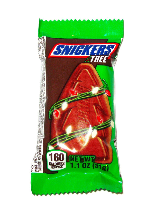 Indulge in the holiday spirit with Christmas Snickers Trees! With its perfect stocking stuffer size, enjoy everything you love about Snickers - creamy chocolate, chewy nougat, and crunchy peanuts - in a festive Christmas tree shape. It's the perfect treat for any chocolate lover this holiday season.