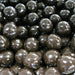 Close-up of dark chocolate malt balls Triple dipped