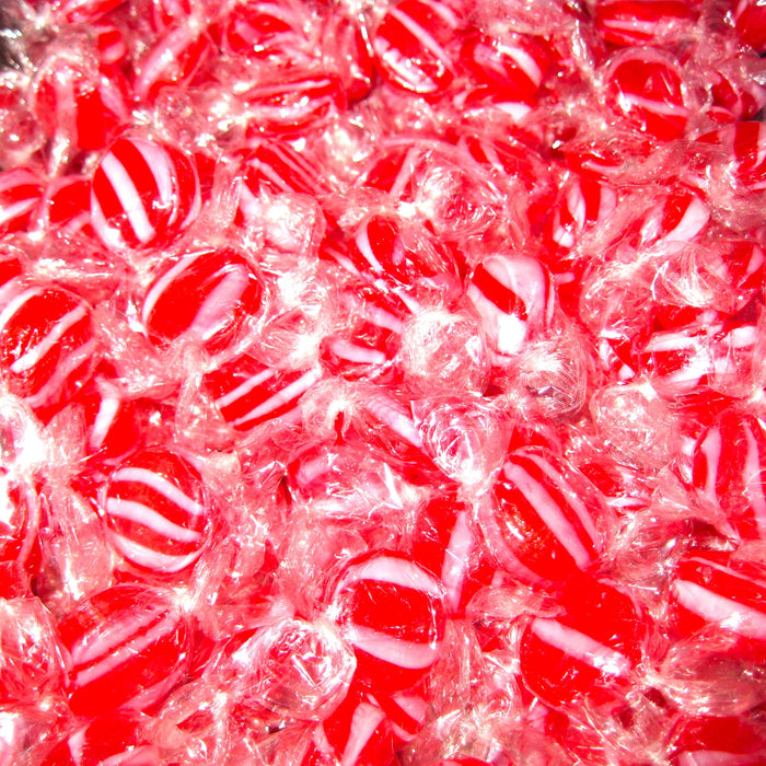 Close-up of red and white striped candies.