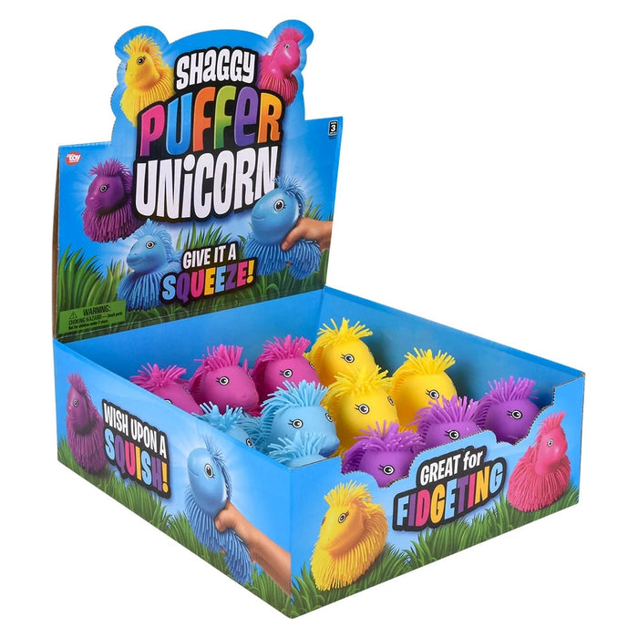 Box of colorful Shaggy Puffer Unicorn toys with text on a white background