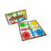 Pachisi board game with colorful tiles and a dice on a white background