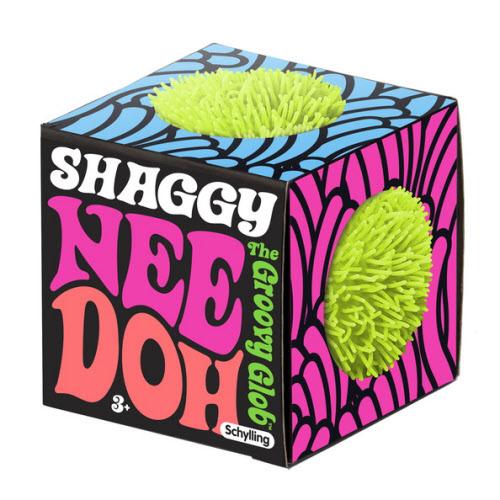 Shaggy Nee Doh toy with colorful packaging on a white background
