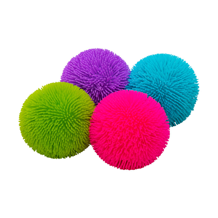 Shaggy Nee Dohs with a textured ball on a white 