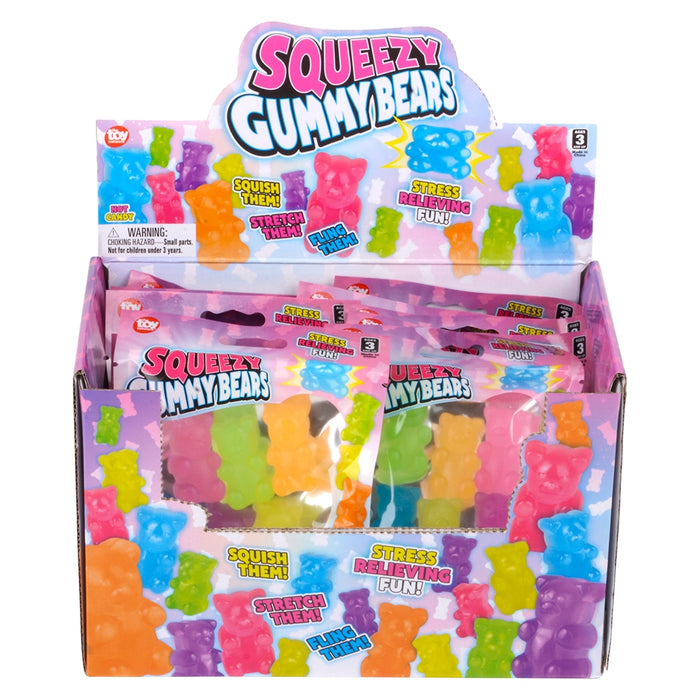 Display of Squeeze Gummy Bears packaging with colorful gummy bears inside.