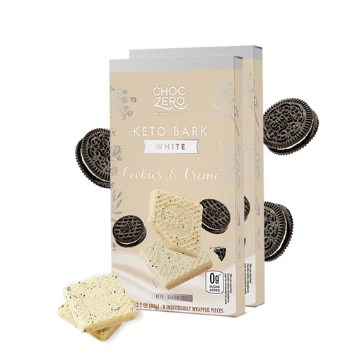 Box of ChocZero Keto Bark White Cookies & Creme with cookies around on a white background