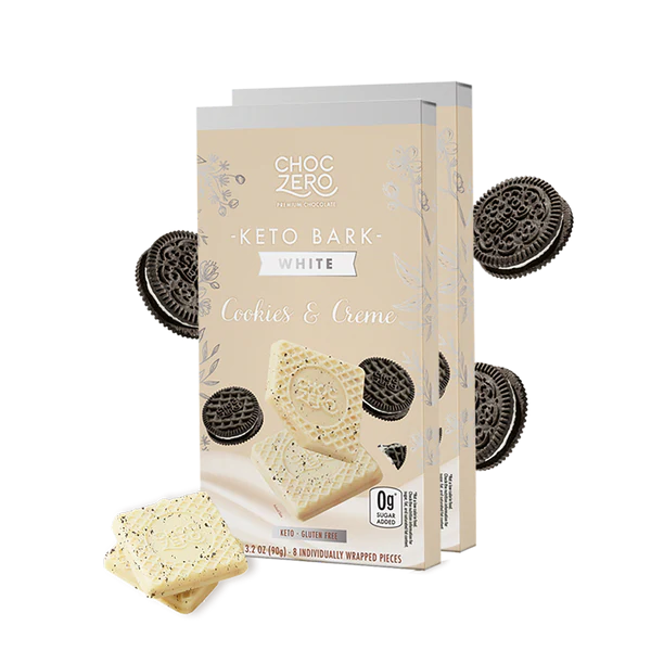 Box of ChocZero Keto Bark White Cookies & Creme with cookies around on a white background