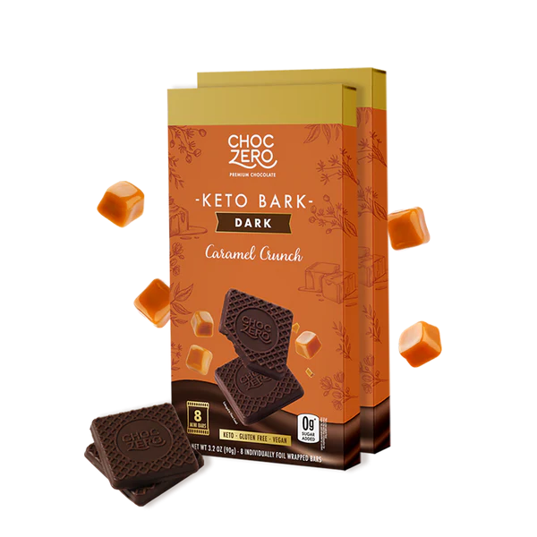 Box of ChocZero Keto Bark Dark Caramel Crunch with chocolate pieces on a white background