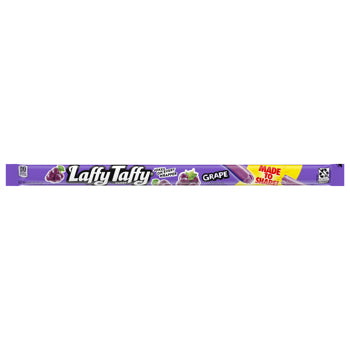 A long, narrow package of Lafty Taffy Grape flavor candy on a plain white background. The packaging is primarily purple with white, yellow, and black text, and includes a small yellow 'Made in USA' badge.
