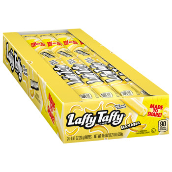 A box of Lafty Taffy Banana flavored holly wraps, showing multiple yellow wrapped candy bars inside a bright yellow retail display box.