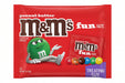 A red bag of M&M's Fun Size chocolate candies with the green M&M's character, peanut butter branding, and a purple 'TREATING SIZE' label.