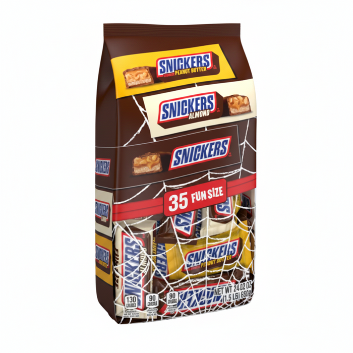 A bag of Snickers Fun Size candy bars, featuring a brown background with white spiderwebs, yellow and red banner accents, and multiple visible Snickers and Reese's packages inside.