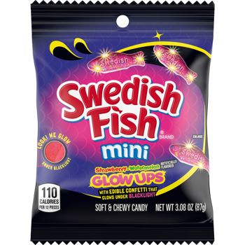 Shine a light on your next snacking session with SWEDISH FISH Mini Glow Ups Strawberry-Watermelon Soft & Chewy Candy. These fun, fish-shaped candy gummies feature edible confetti that glows under blacklight and a sweet strawberry-watermelon flavor. The edible confetti in this unique candy contains flavorless turmeric extract, which gives it its fun glow. The first-ever gummy candy fish that glows, SWEDISH FISH Mini Glow Ups are a must-try for fans of bold, adventurous candy experiences.