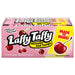 A box of Laffy Taffy Cherry Stretchy and Tangy candy bars, featuring pink packaging with cherry illustrations and a yellow 'Made to Share!' label.