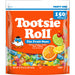A 37 oz bag of Tootsie Roll The Fruit Ones party candy, featuring a bright orange package with white lettering, a cartoon penguin, and illustrations of cherry, orange, lime, and vanilla flavors.
