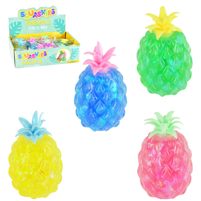 Colorful pineapple-shaped stress balls with packaging on a white background